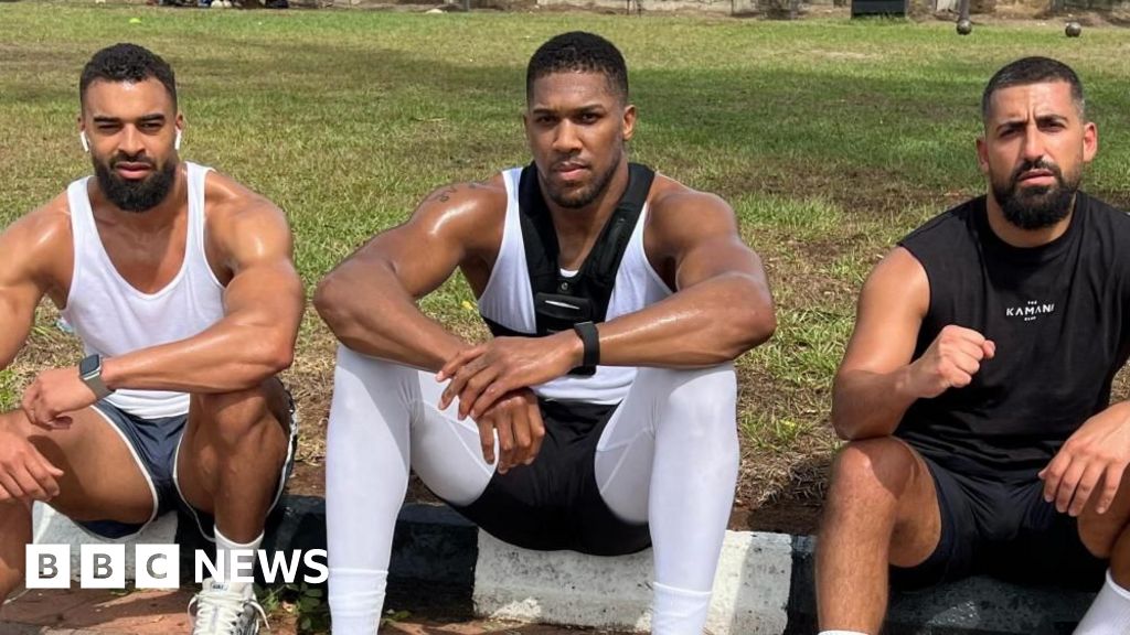 Heavyweight Champion Anthony Joshua Sustains Injuries in Tragic Nigerian Road Collision Claiming Two Lives from His Entourage