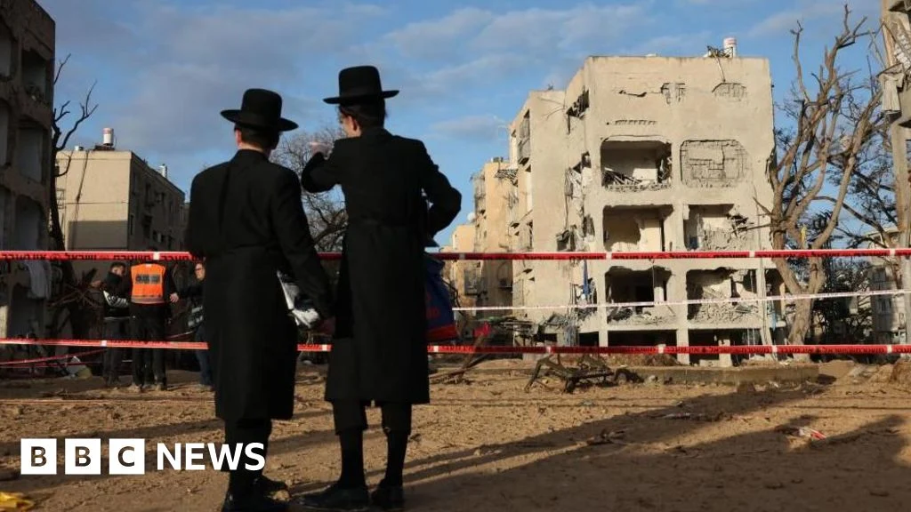 Escalation Deepens: Iranian Ballistic Missiles Strike Israeli Towns Near Covert Nuclear Facility, Injuring Over 160