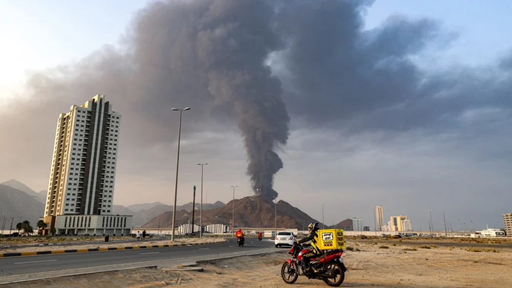 Escalation in the Gulf: Drone Fragments Ignite Emirati Oil Hub Amidst Heightened Iranian Energy Warfare