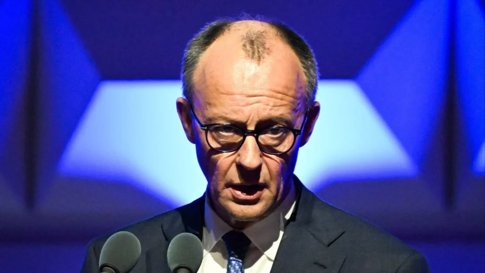 German Opposition Leader Friedrich Merz Criticizes U.S. Policy Shift on Russian Oil Sanctions Amidst Middle East Tensions